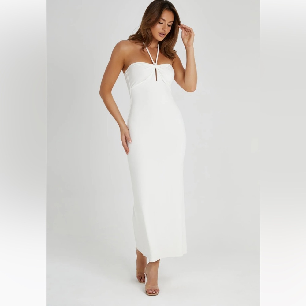 Meshki NWT.  beautiful bodycon dress,very flattering on. Never got to wear